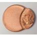UNITED STATES OF AMERICA . UNDATED . ONE 1 CENT COIN . ERROR . MIS-STRIKE
